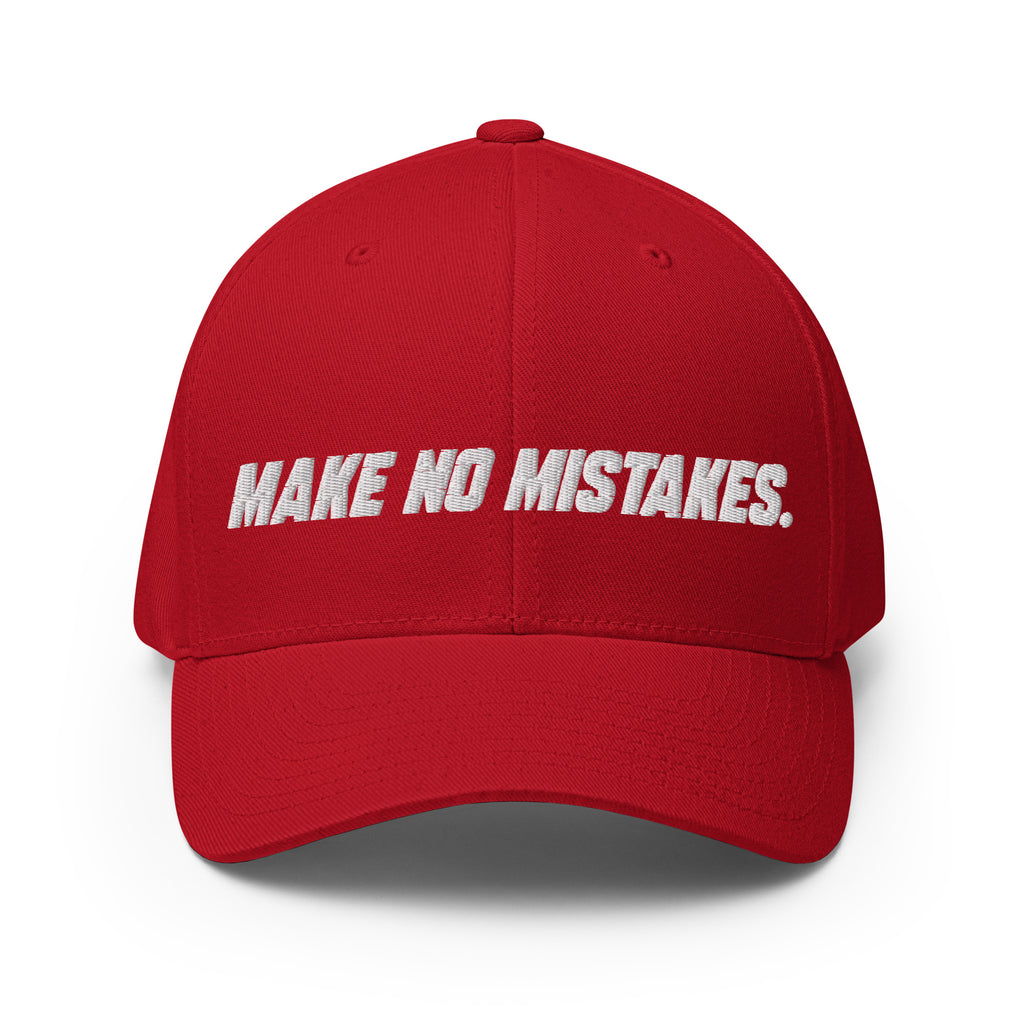Front view of the red MAKE NO MISTAKES. cap with white embroidered lettering and a curved visor.