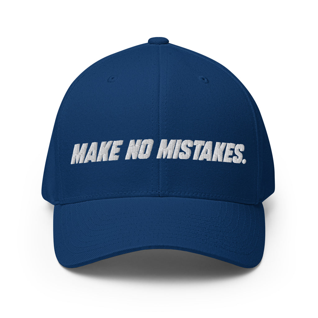 Front view of the royal blue MAKE NO MISTAKES. cap with white embroidered lettering and a curved visor.