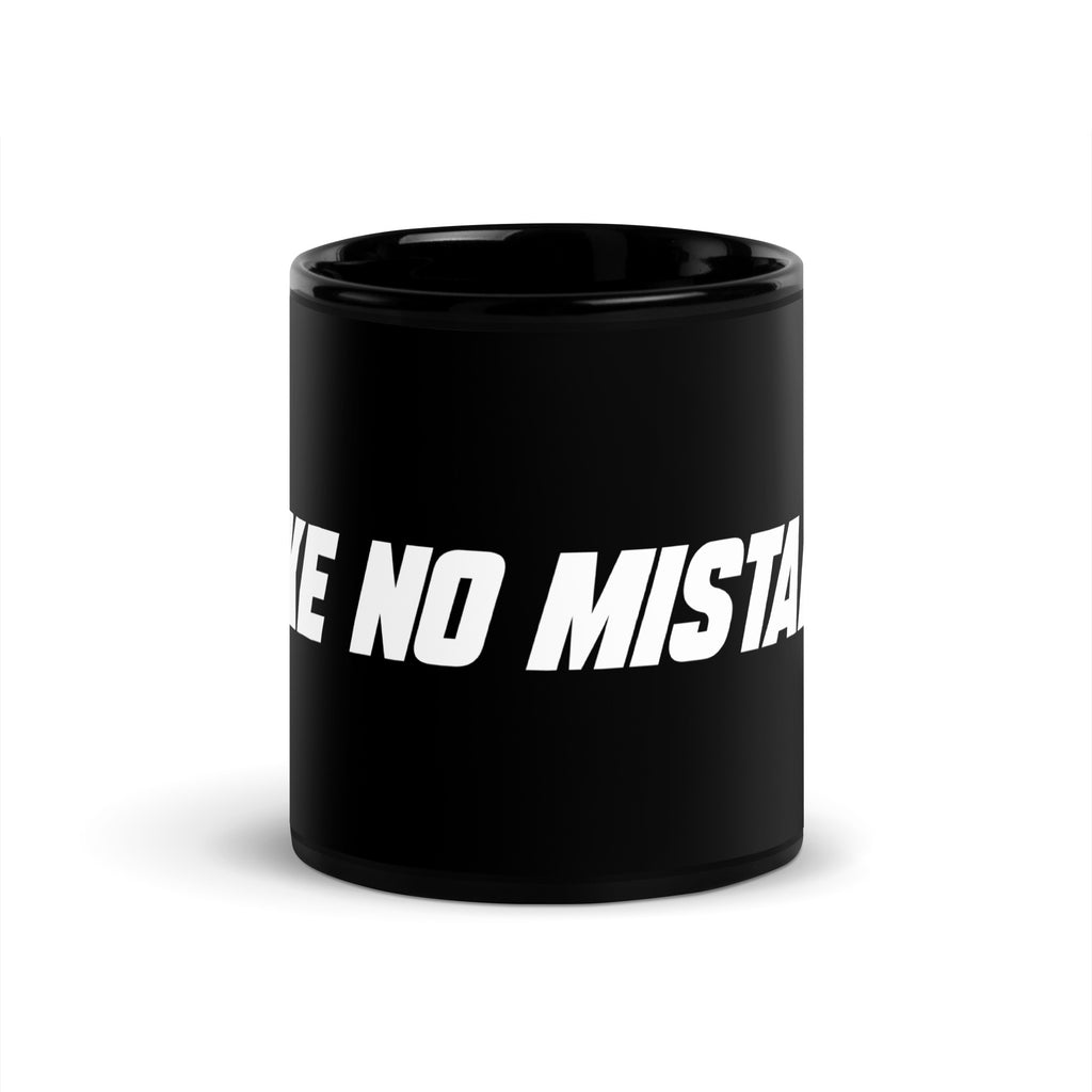 Front view of the black 11 oz MAKE NO MISTAKES. ceramic mug with bold white lettering and a glossy finish.
