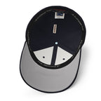 Interior view of the dark navy Super Intelligence cap, showing the stretch band, panel construction and silver underside of the visor.