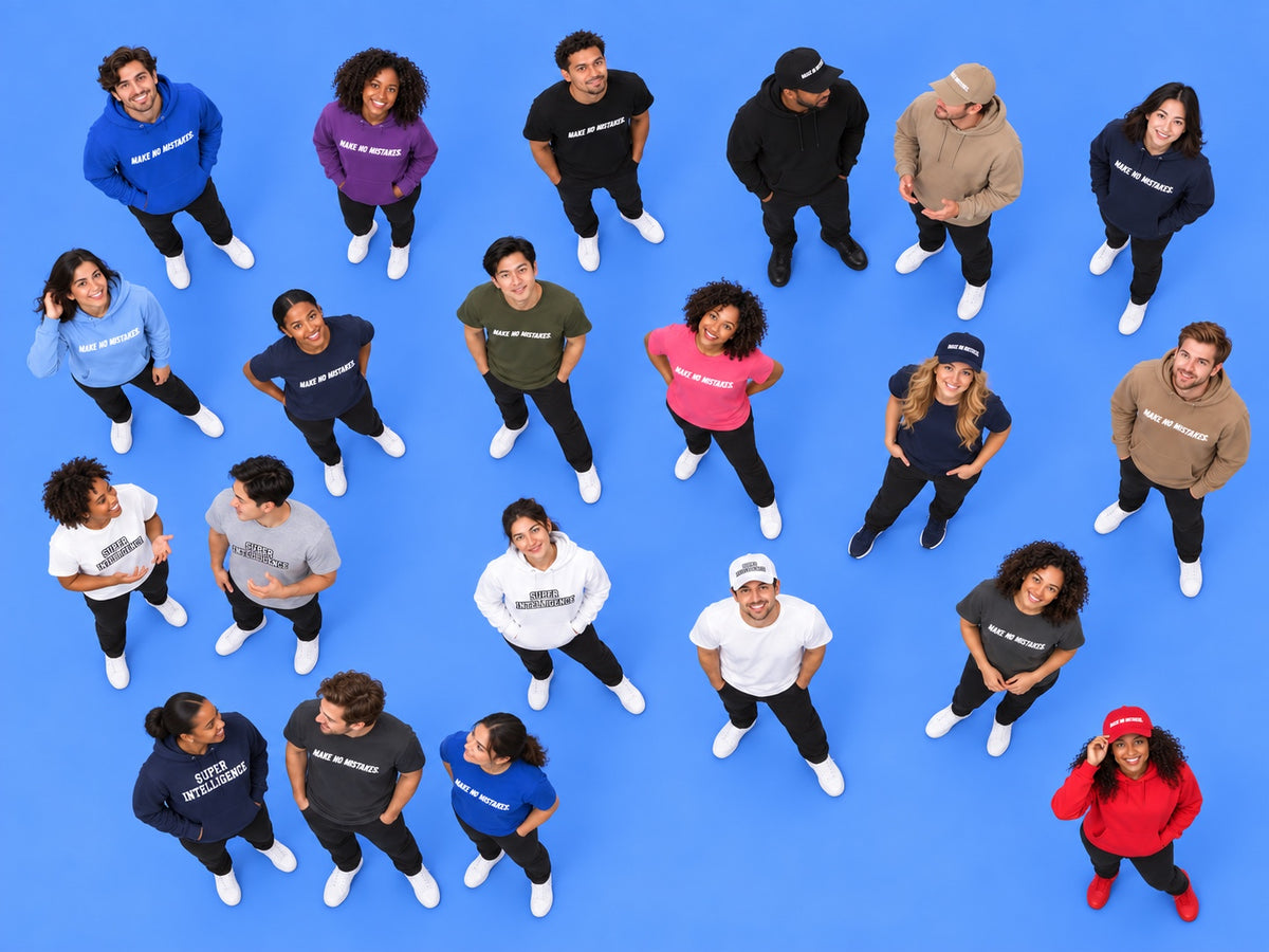 Aerial view of 21 models wearing Super Intelligence and MAKE NO MISTAKES. T-shirts, hoodies and caps, looking up or chatting on a blue background.
