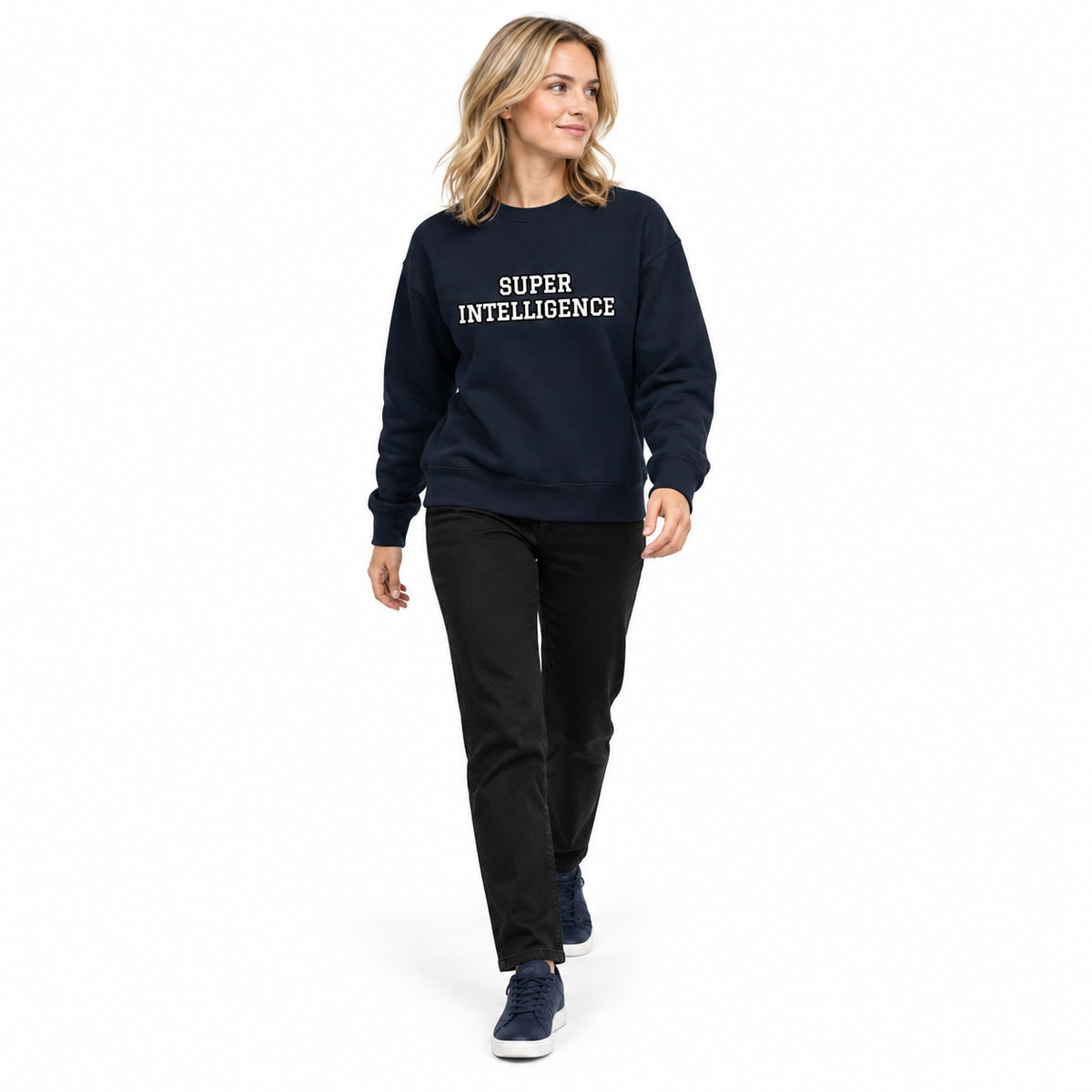 Full-body blonde model wearing the navy blazer Super Intelligence sweatshirt with a two-line chest print and matching navy shoes, stepping forward on white.