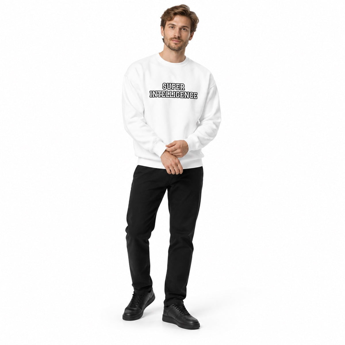 Full-body model wearing the white Super Intelligence sweatshirt with a black-outlined two-line chest print, adjusting his cuff with black trousers and shoes on white.