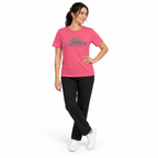 Full-body model wearing the charity pink Super Intelligence T-shirt with the front graphic visible, standing with one hand on the hip and ankles crossed on a plain white background.